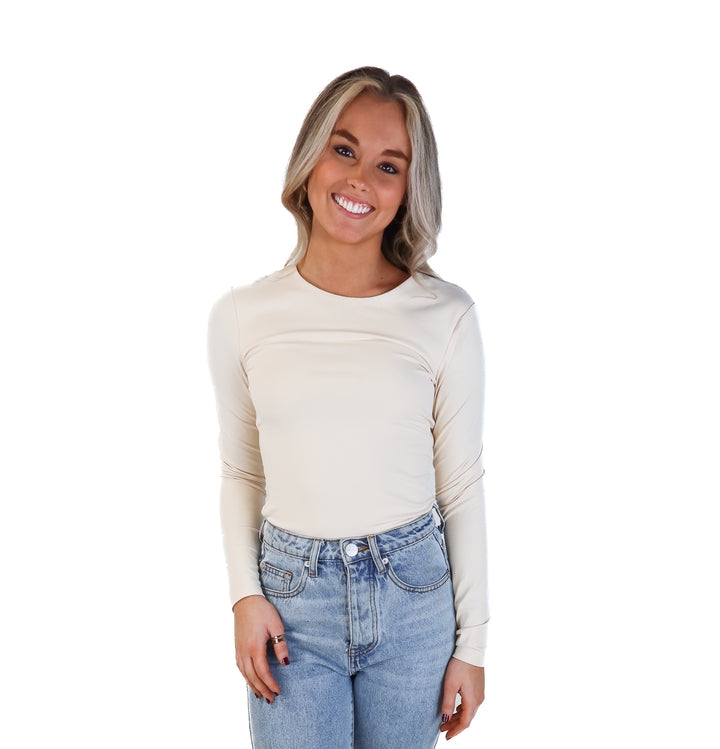 Nuuds cream long sleeve bodysuit (s; retail $58)
