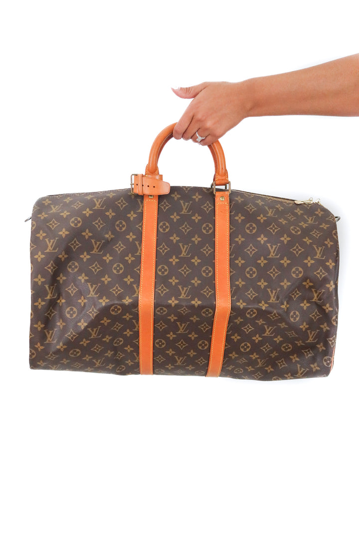 Louis Vuitton Keepall Bandouliere 55 (retail $2,700)