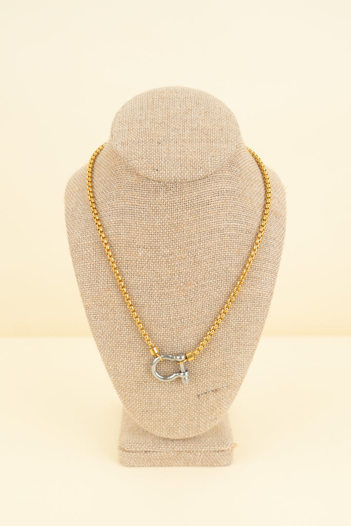 gold chain necklace with silver horseshoe shackle clasp (os; retail $85)