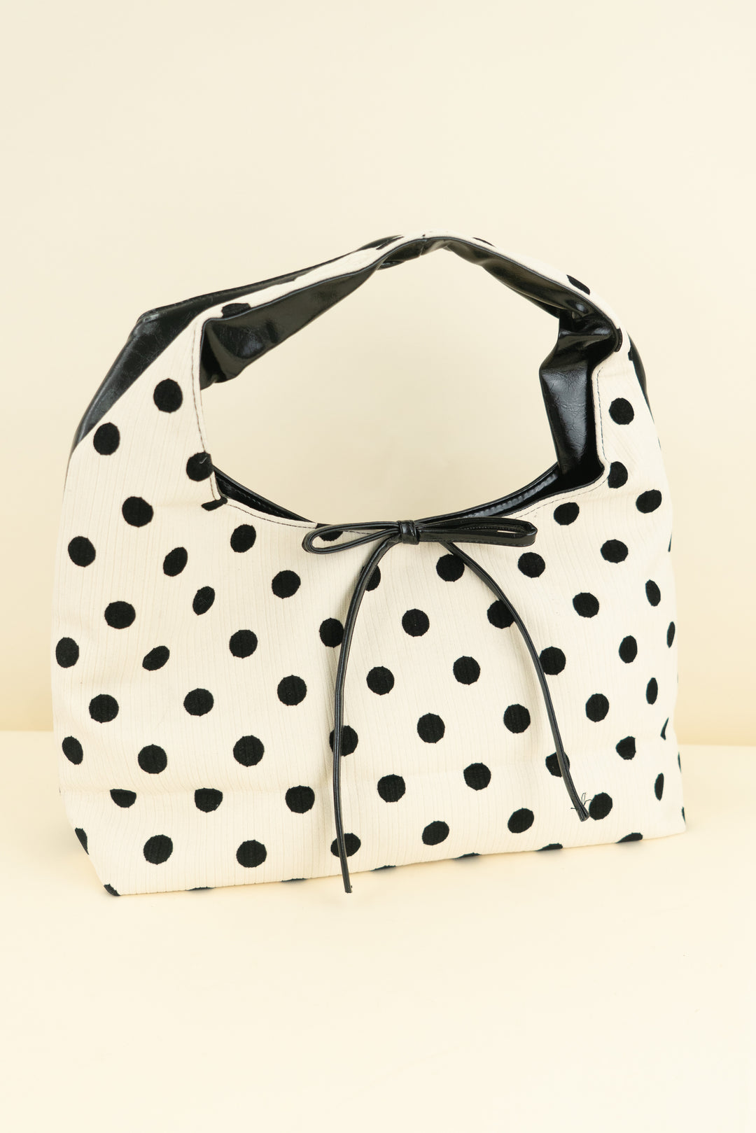 cream & black polka dot bag w/ bow (os; retail $30)