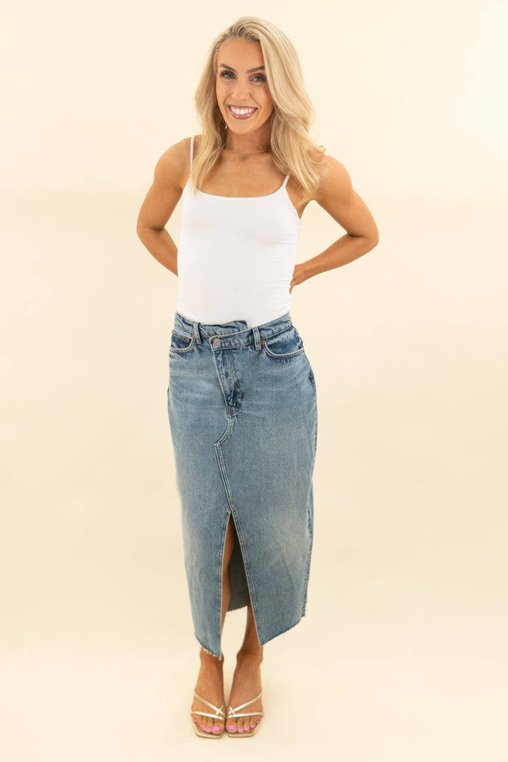 reformation medium wash midi denim skirt with front slit (27; retail $168)