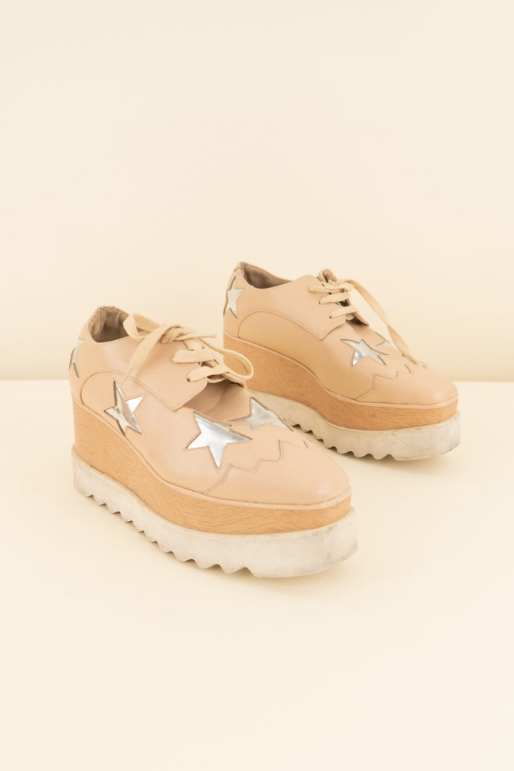 stella mccartney tan/silver stars platform sneakers (37/ US 7; retail $990)