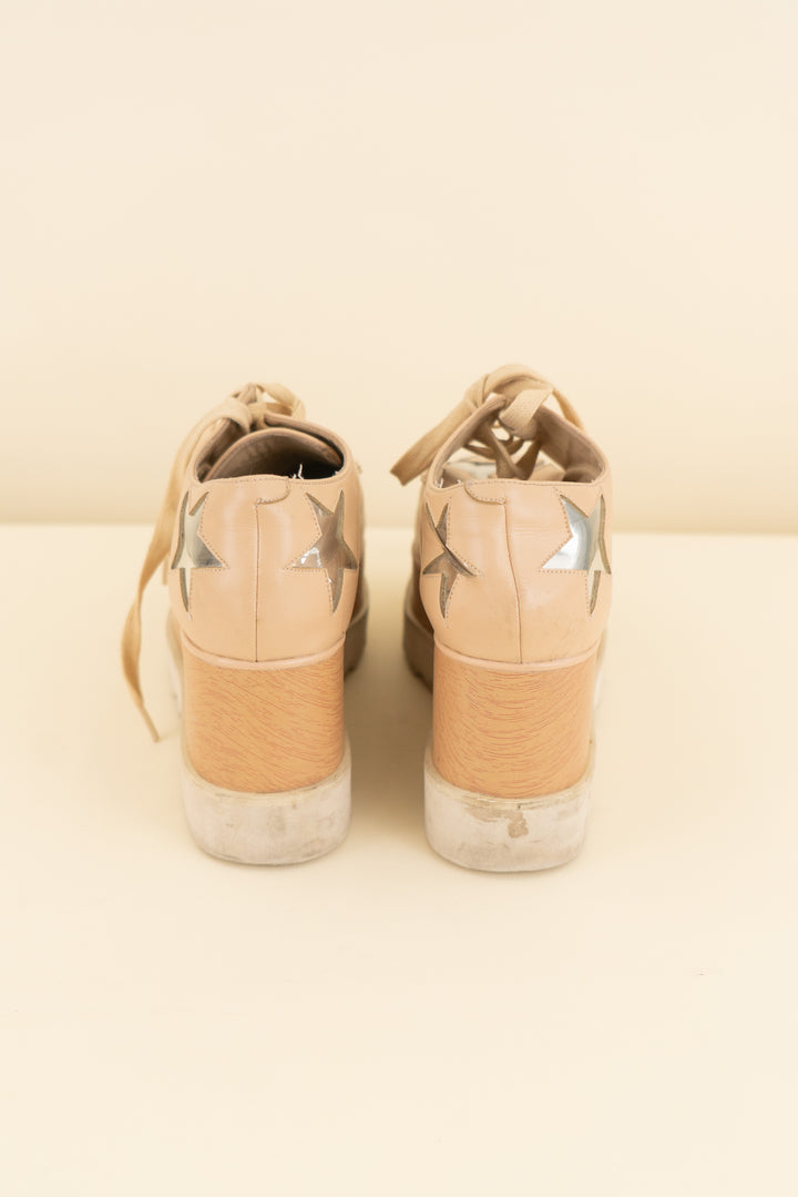 stella mccartney tan/silver stars platform sneakers (37/ US 7; retail $990)