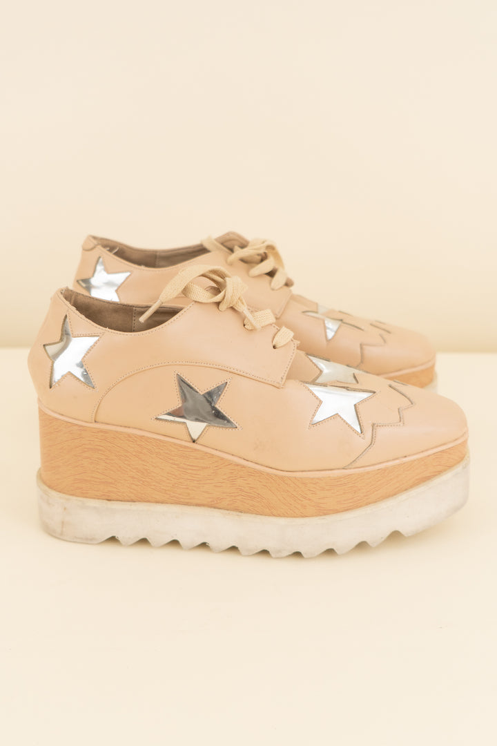 stella mccartney tan/silver stars platform sneakers (37/ US 7; retail $990)