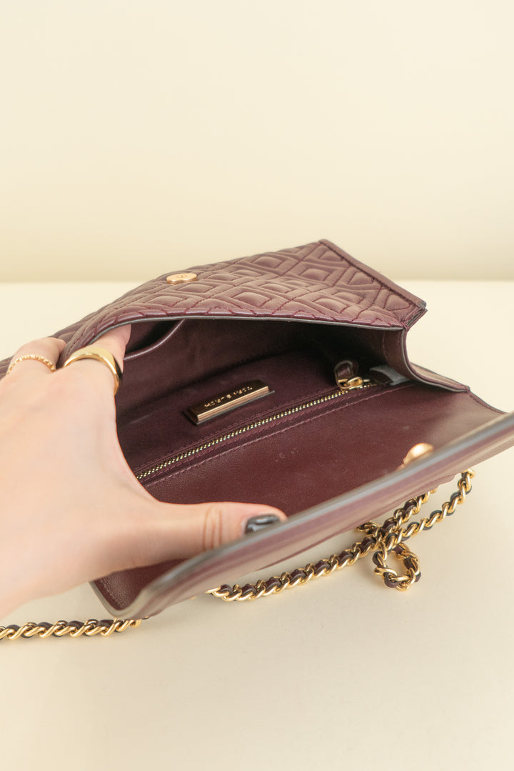 Tory Burch small burgendy adjustable shoulder bag (OS; retail $528)