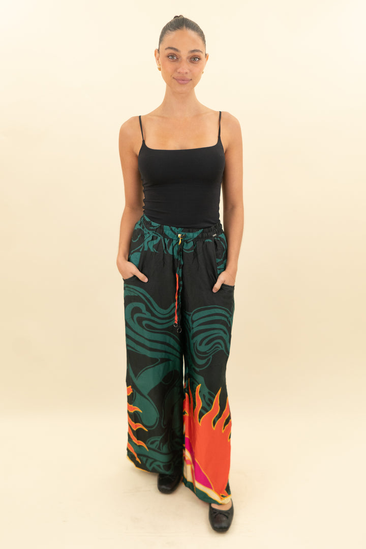maaji green/black/orange drawstring pants w/ sun on leg (s; retail $144)