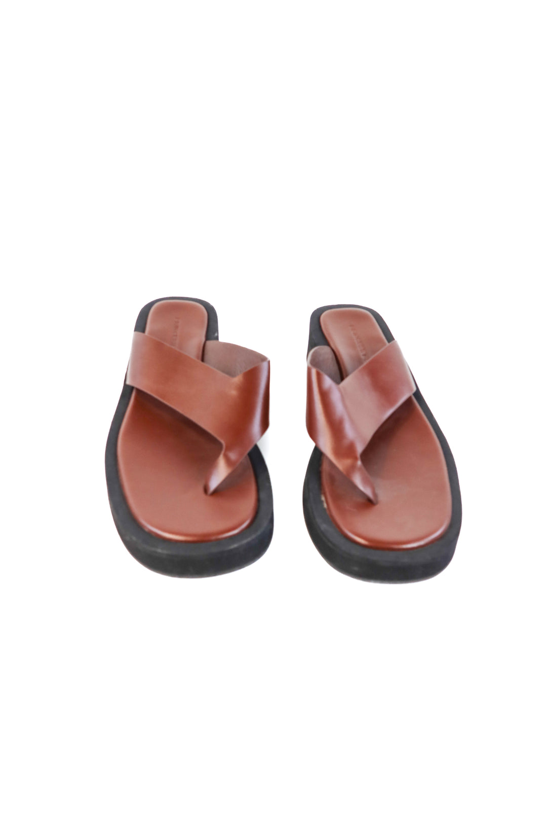 Princess Polly brown platform flip flops (8; retails for $59)