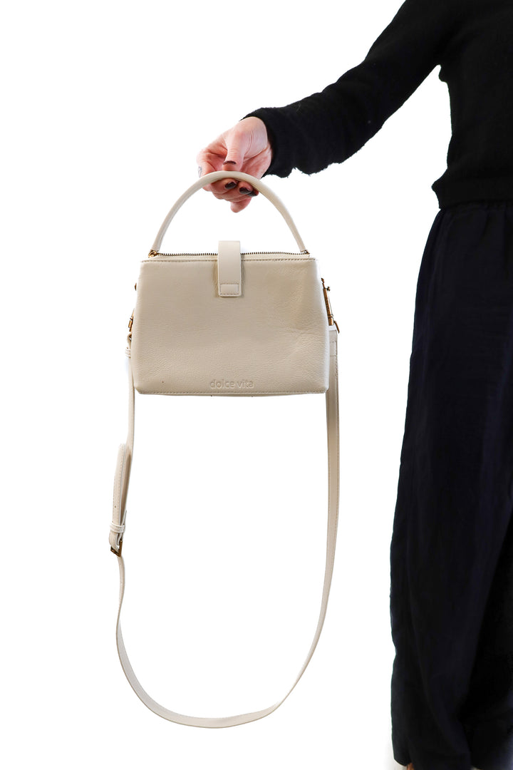 Dolce vita cream/gold purse (retail $198)