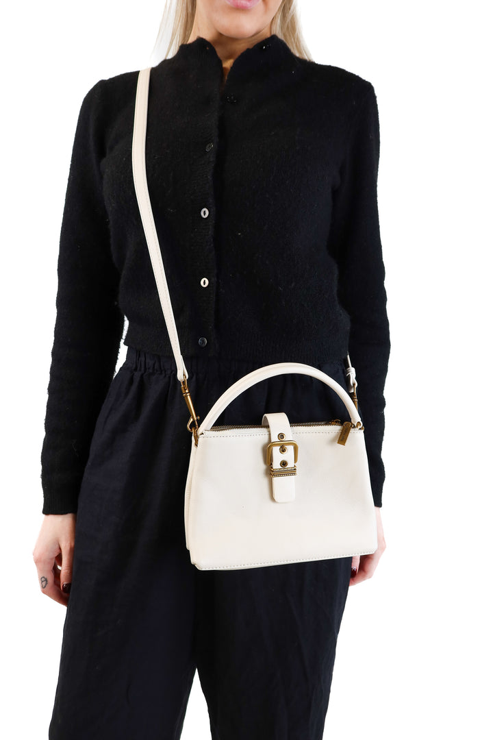 Dolce vita cream/gold purse (retail $198)
