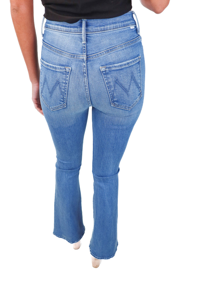 mother light wash flare jeans (24; retail $238)