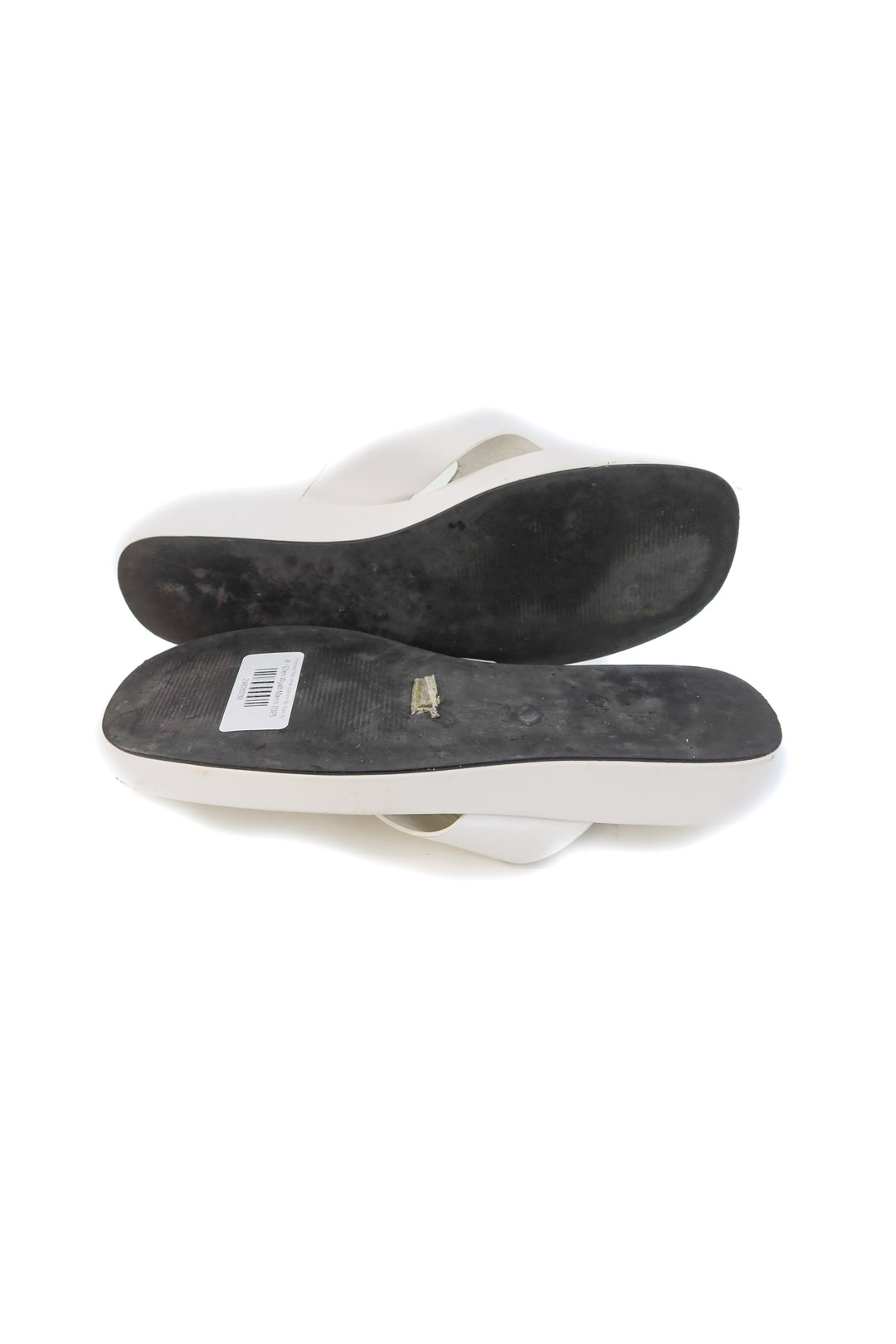 Princess Polly white platform flip flops (8; retails for $59)