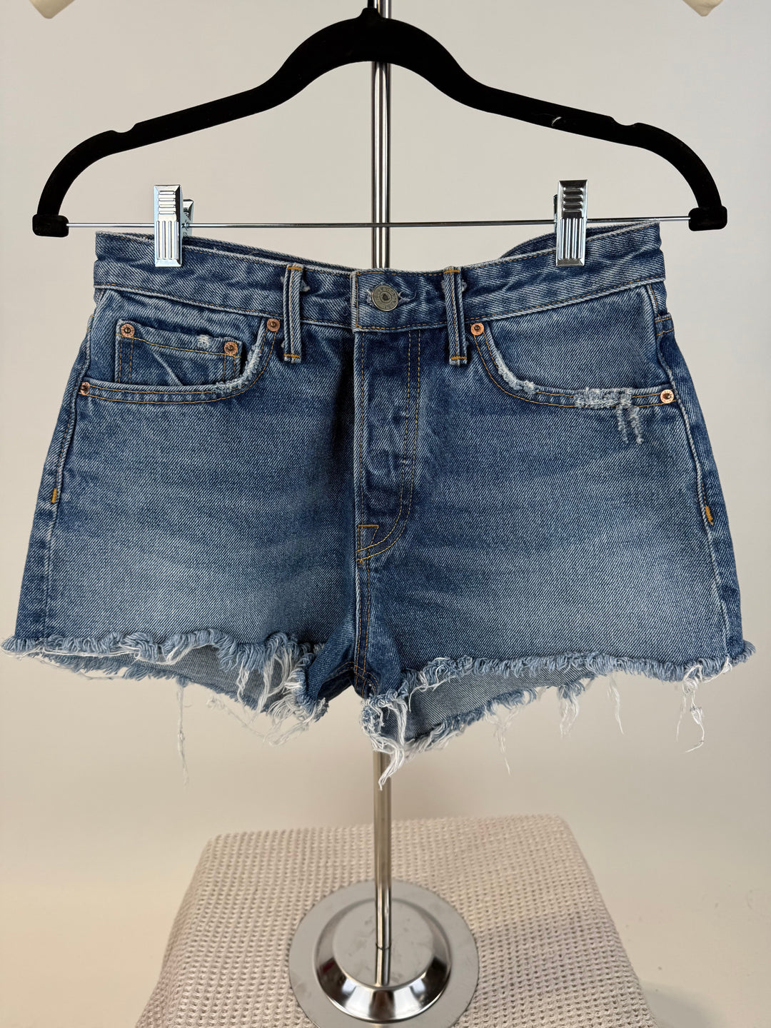 SOLD: grlfrnd medium wash shorts (27; retail $165)