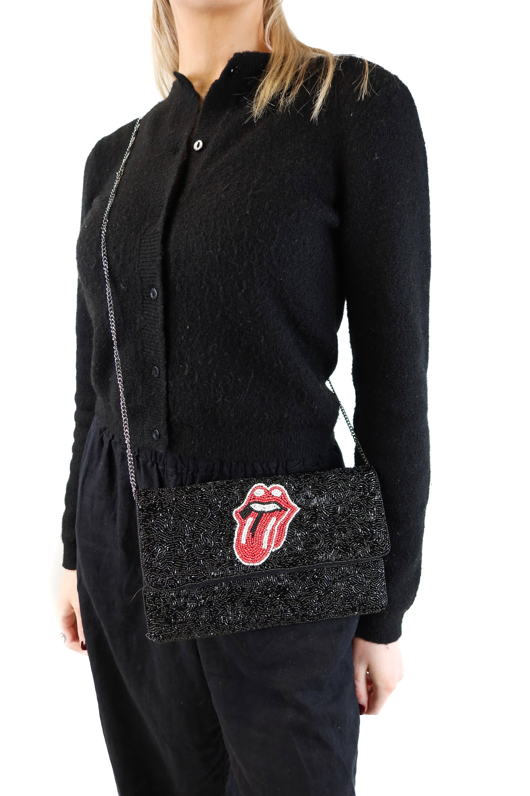 Black beaded clutch with red tongue graphic