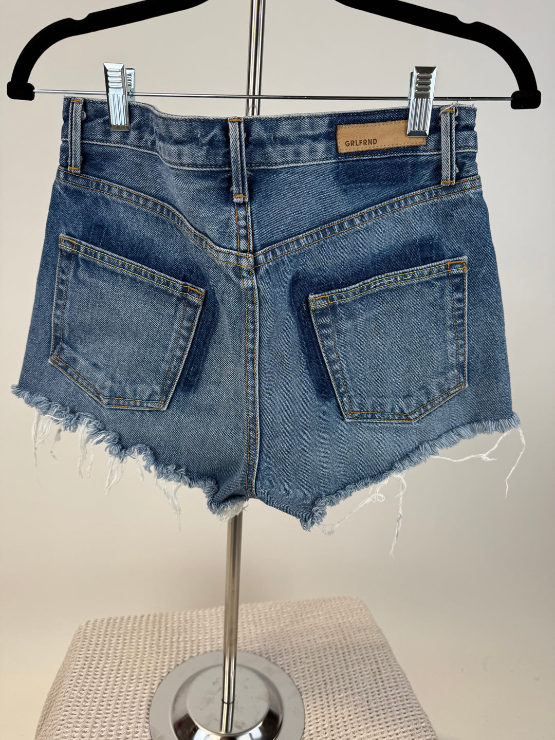 SOLD: grlfrnd medium wash shorts (27; retail $165)