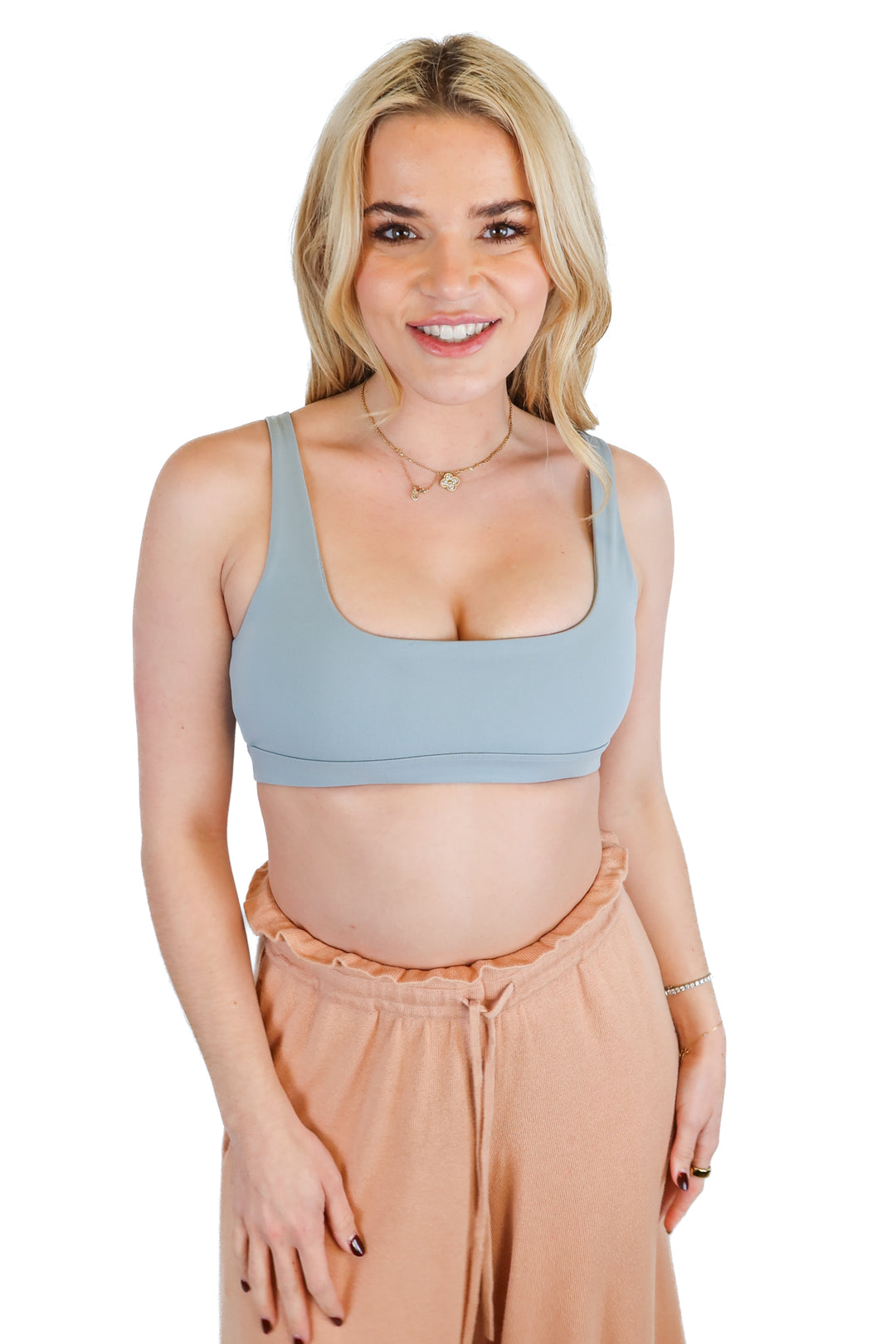 Acta light teal sports bra (M; retail $34)