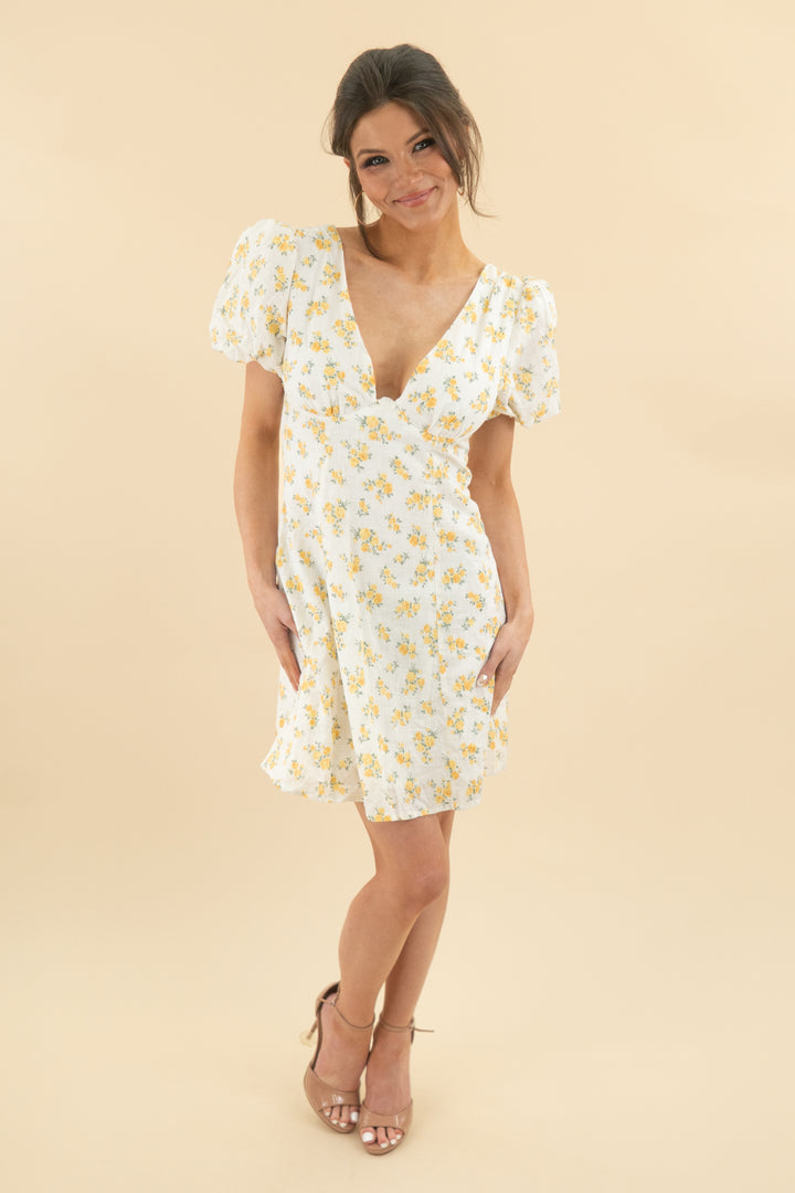 14. astr yellow floral puff sleeve mini dress (s; retail $158)