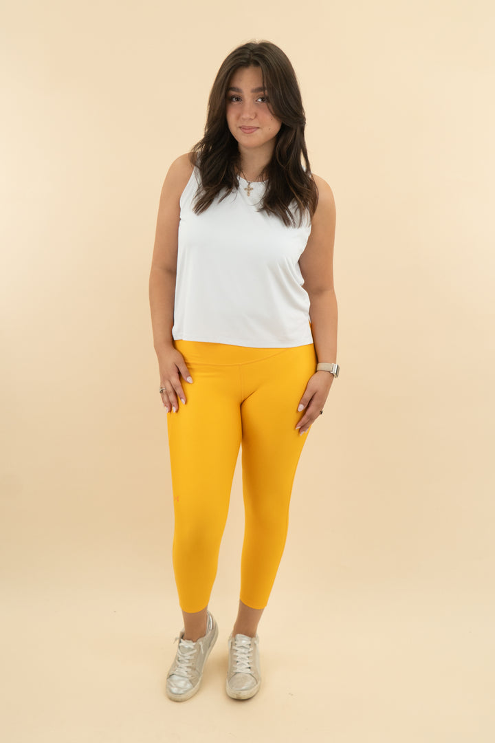 under armour yellow leggings (l; retail $70)