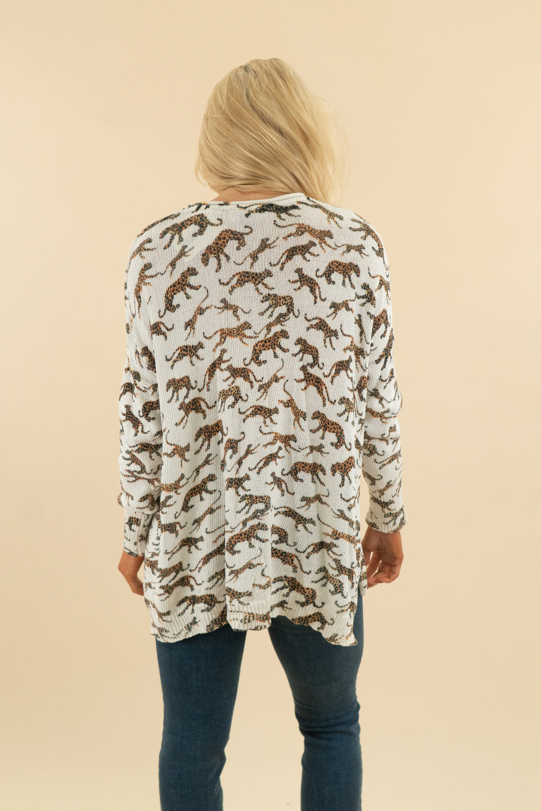 31. show me your mumu white leopoard print knit long sleeve top (m; retail $128)