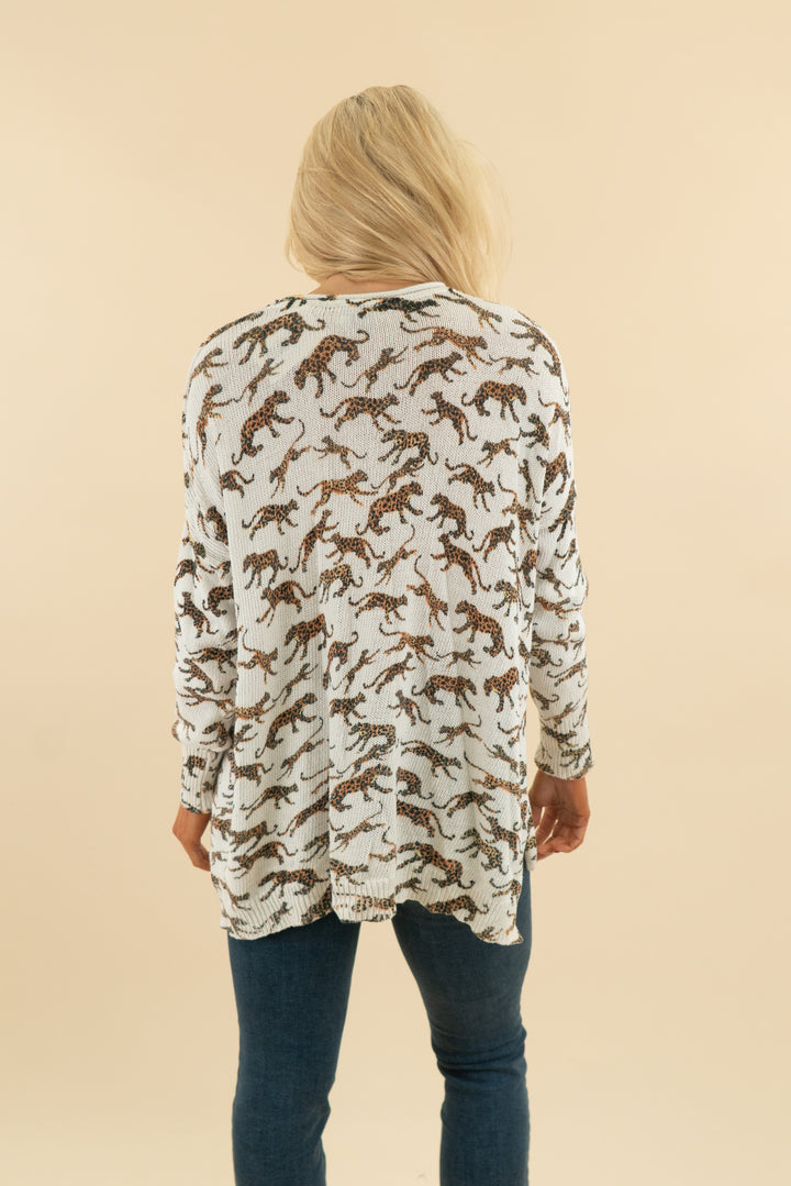 31. show me your mumu white leopoard print knit long sleeve top (m; retail $128)