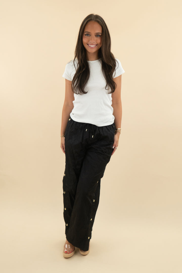 p.e nation black track pants with gold buttons (s; retail $128)
