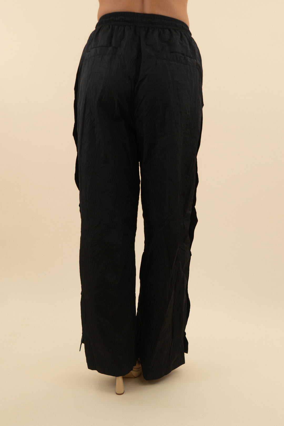 p.e nation black track pants with gold buttons (s; retail $128)