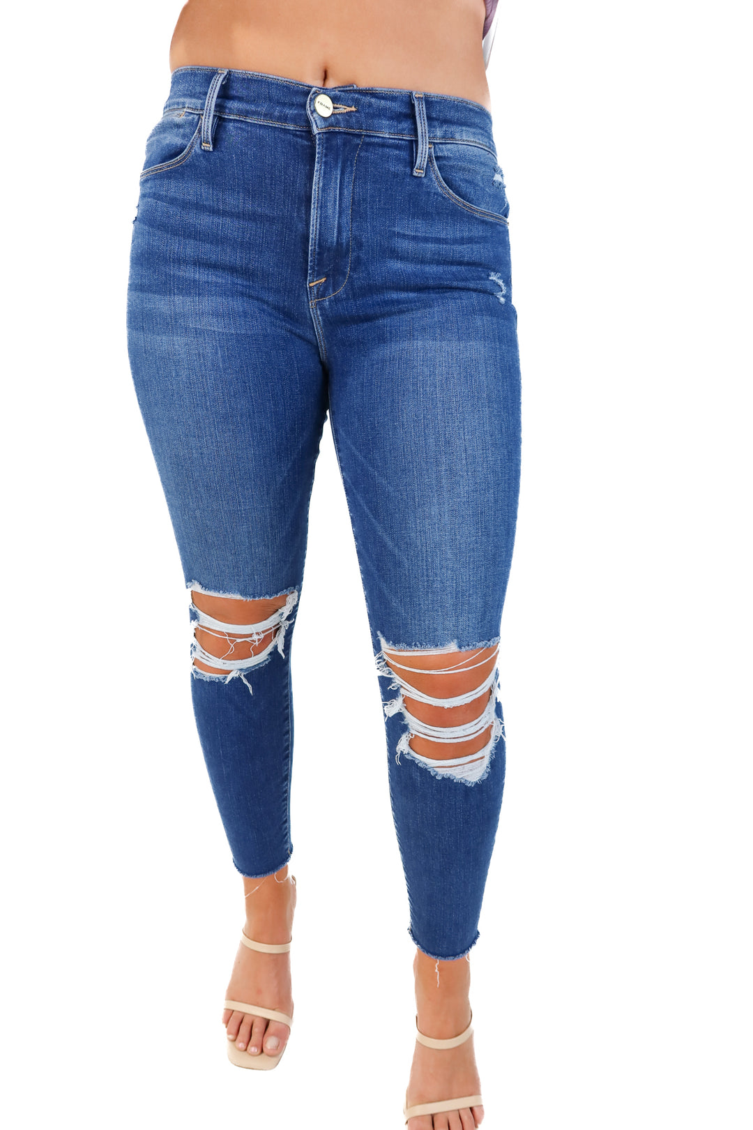 Frame medium wash distressed skinny jeans (28; retail $220)