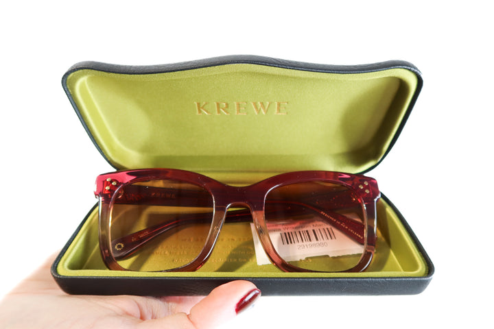 Krewe “Adele” purple sunglasses (retail $255)