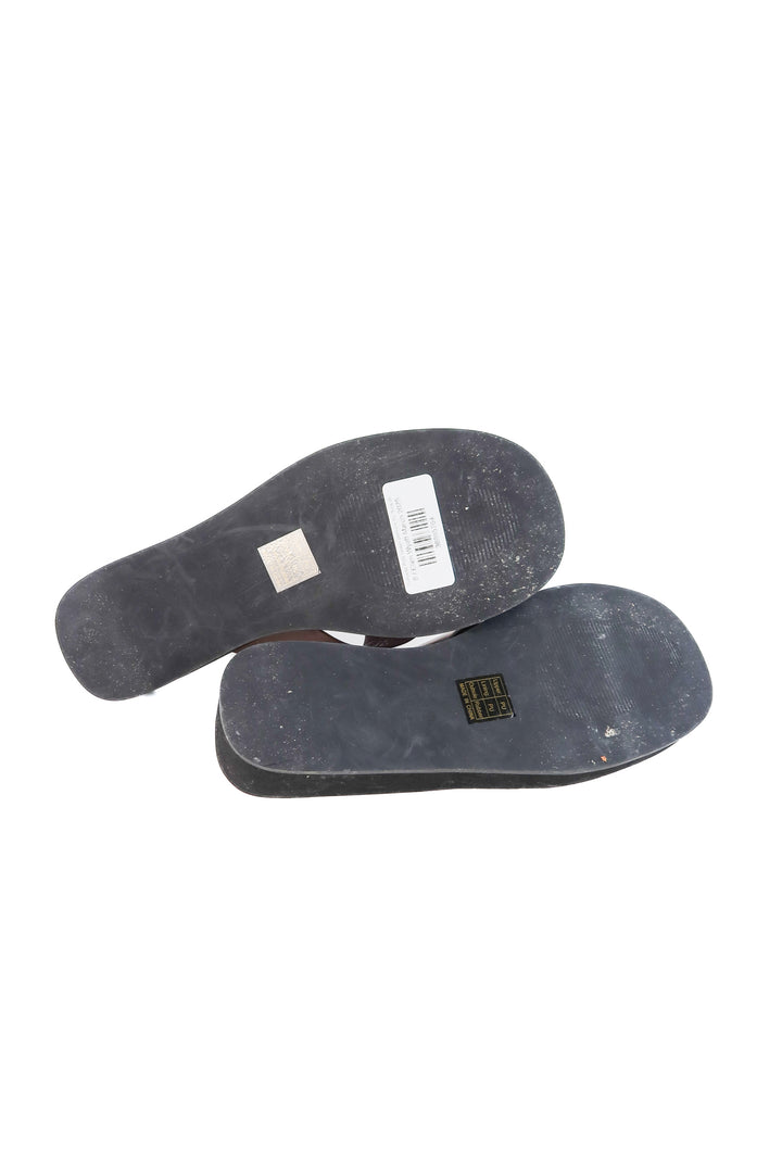 Princess Polly brown platform flip flops (8; retails for $59)