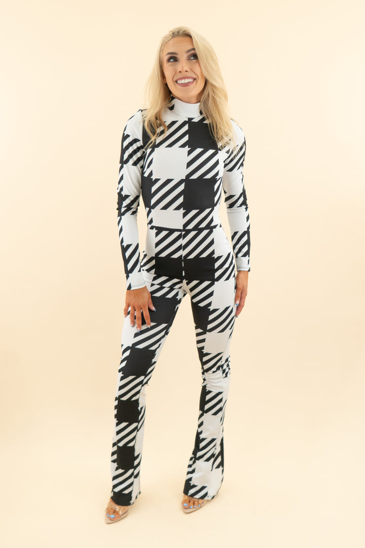 AUCTION akira black and white print long sleeve jumpsuit (s)