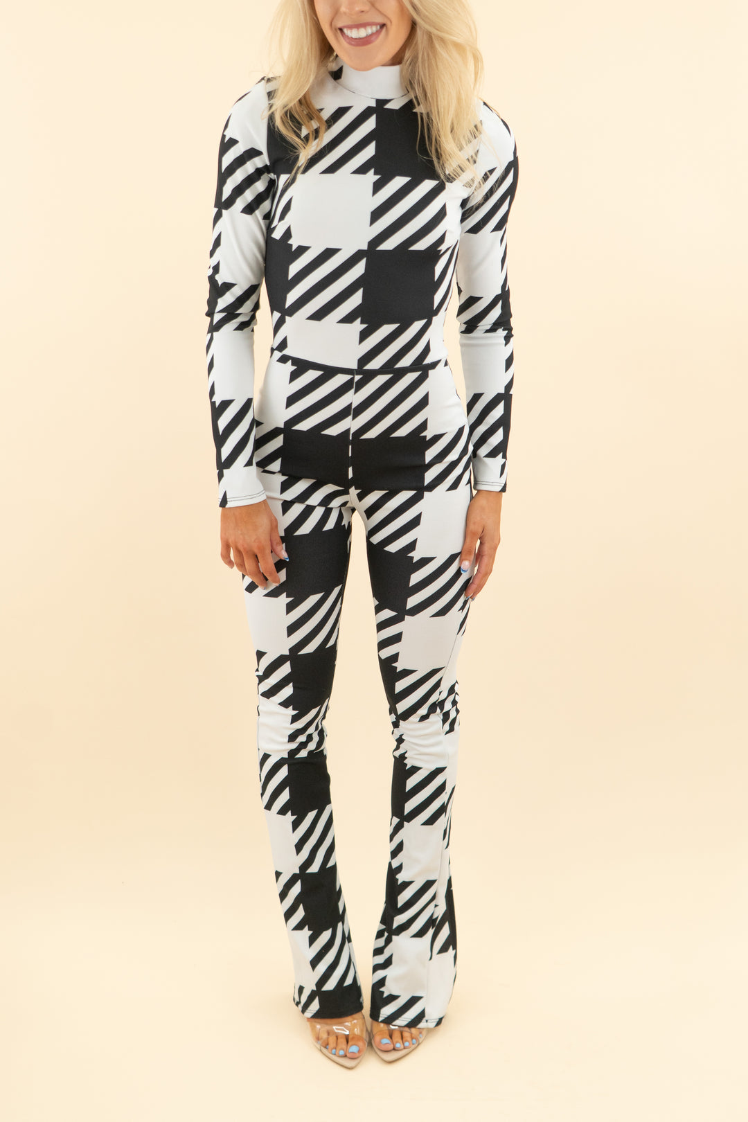 AUCTION akira black and white print long sleeve jumpsuit (s)