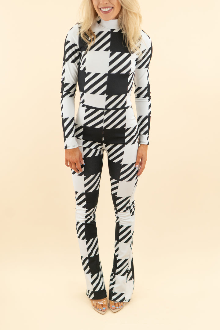 AUCTION akira black and white print long sleeve jumpsuit (s)