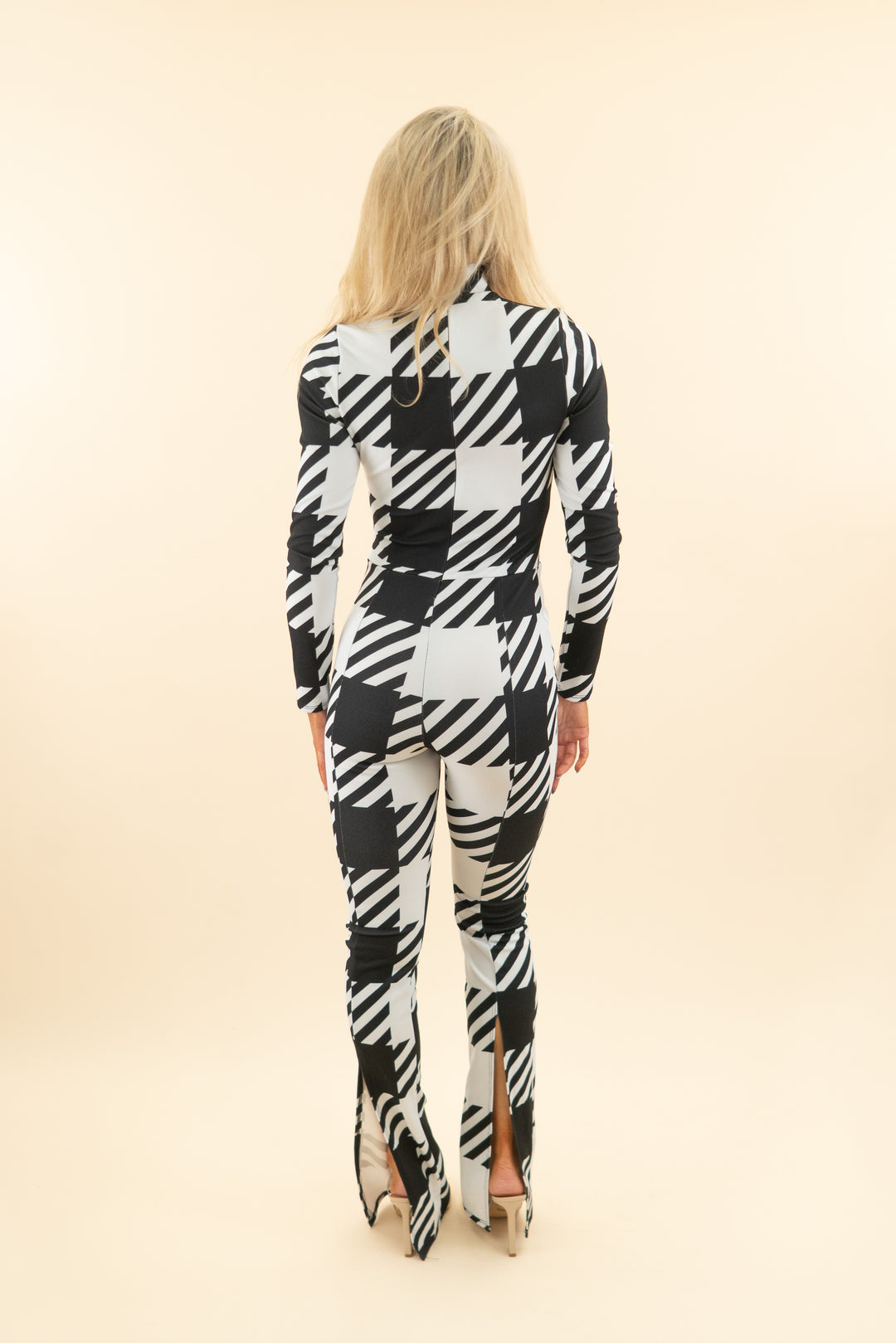 AUCTION akira black and white print long sleeve jumpsuit (s)