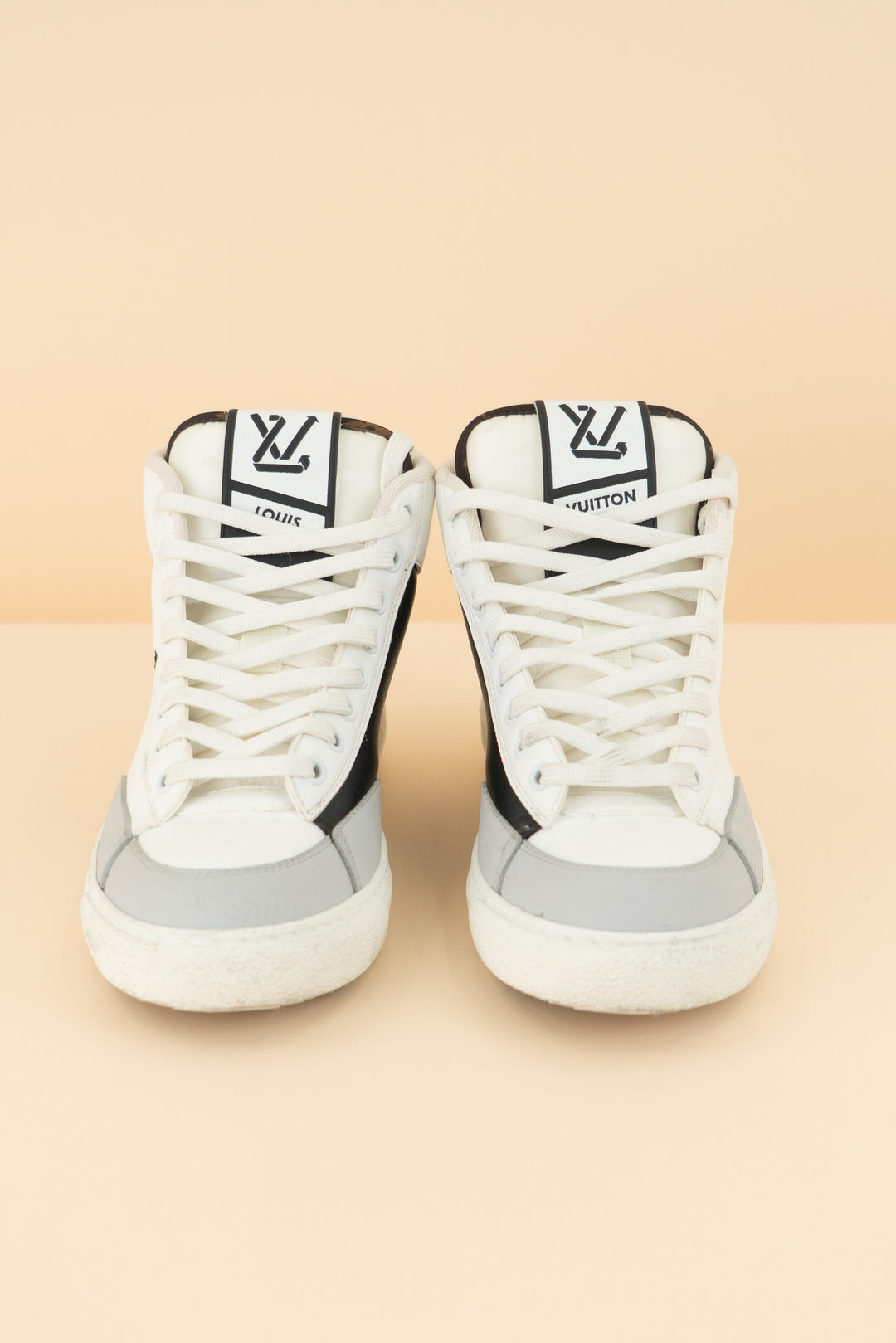 louis vuitton white/black high top sneakers (38/ US 7-8; retail $1,360)