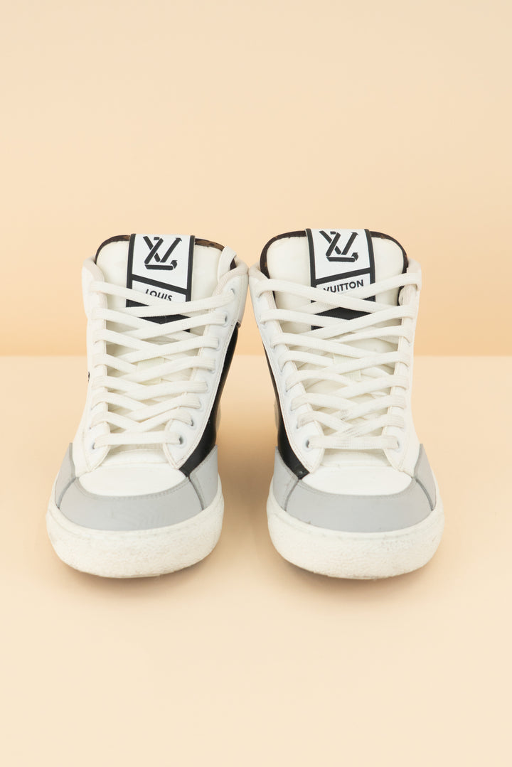 louis vuitton white/black high top sneakers (38/ US 7-8; retail $1,360)