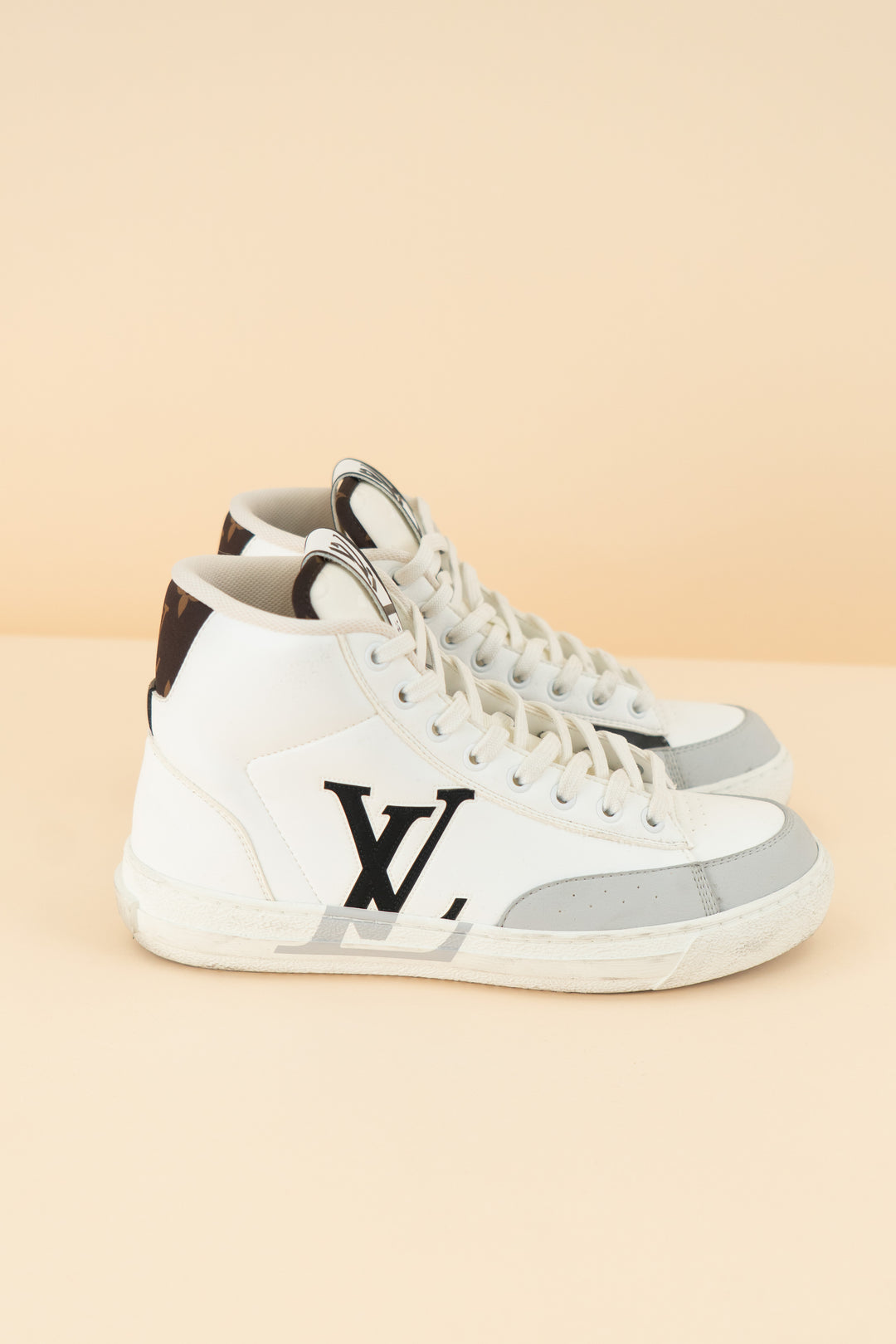 louis vuitton white/black high top sneakers (38/ US 7-8; retail $1,360)