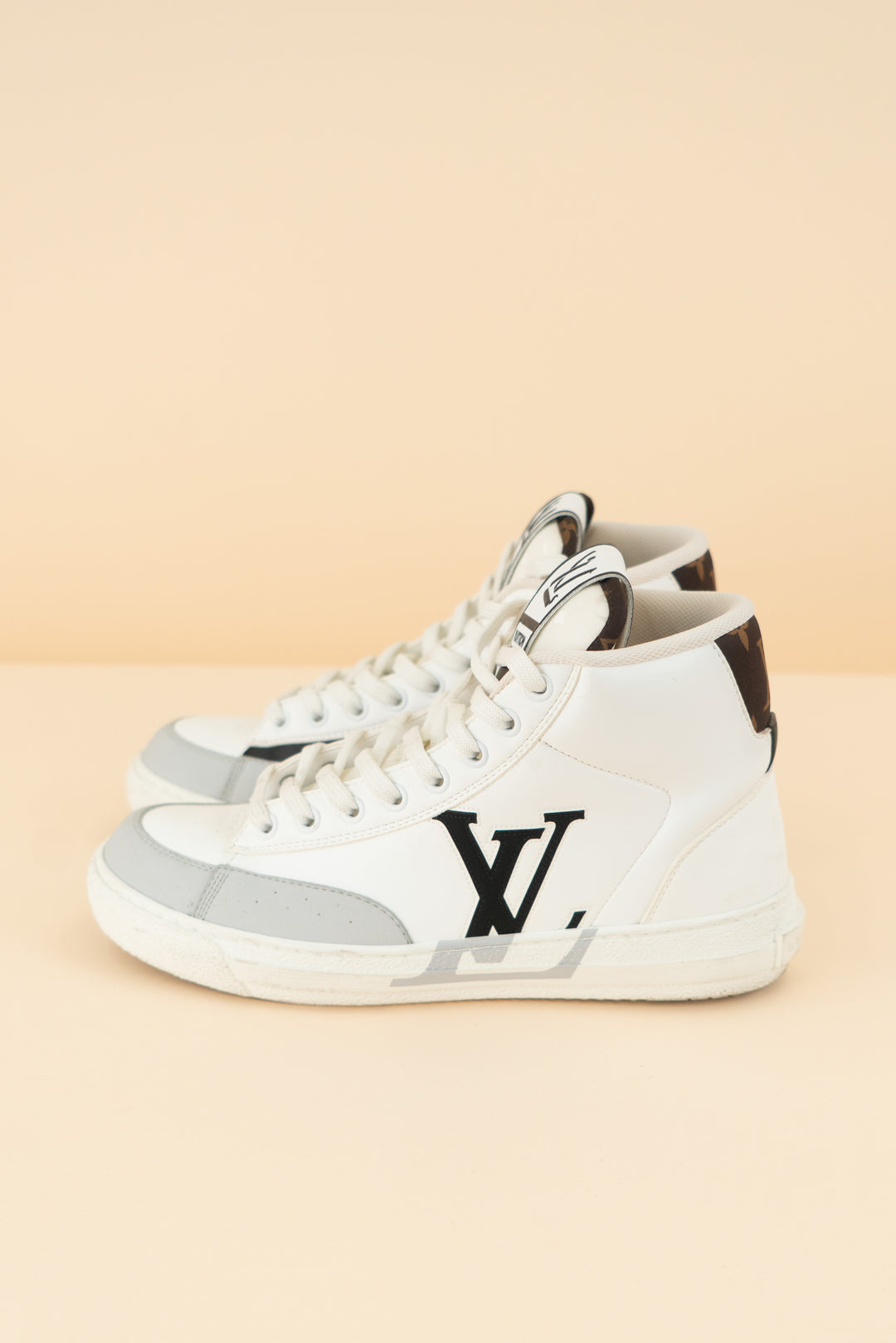 louis vuitton white/black high top sneakers (38/ US 7-8; retail $1,360)
