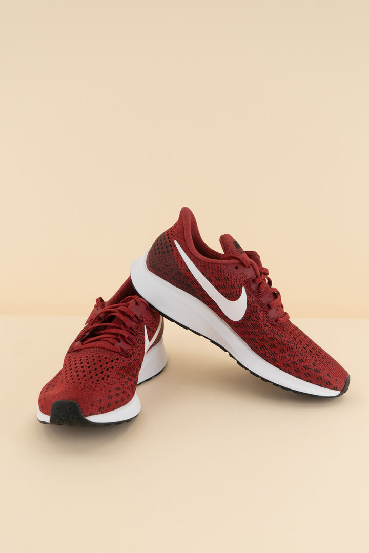 nike crimson running shoes (8; retail $120)