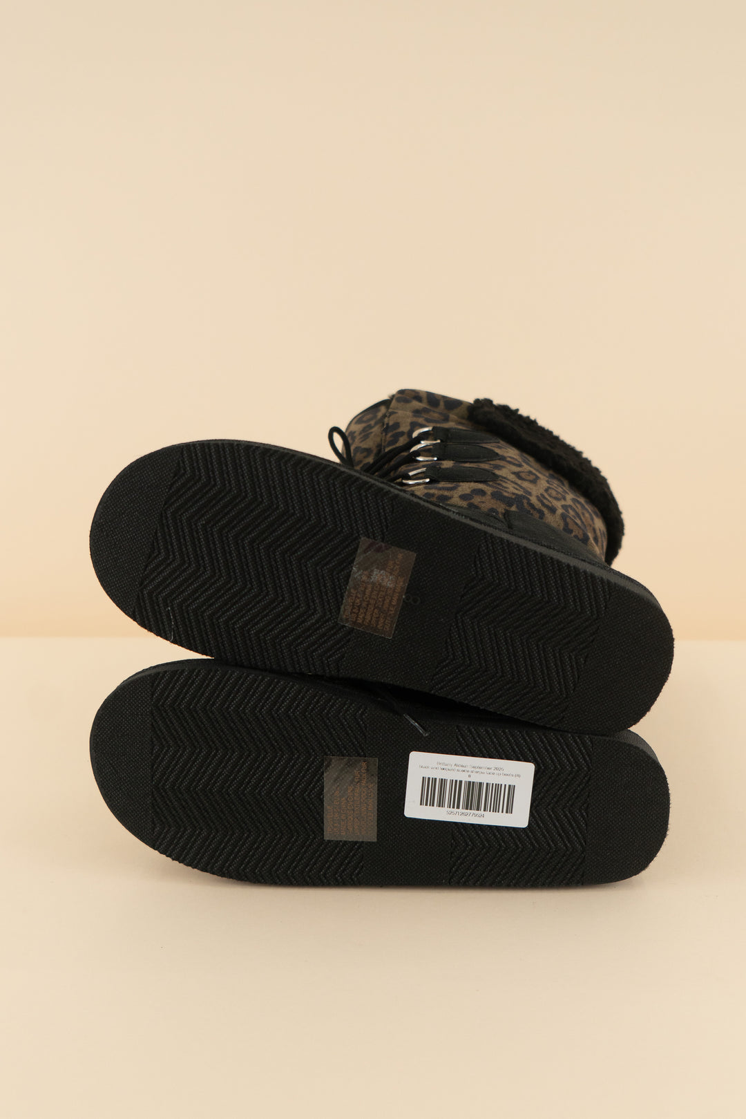 black and leopard suede sherpa lace up boots (8; retail $45)