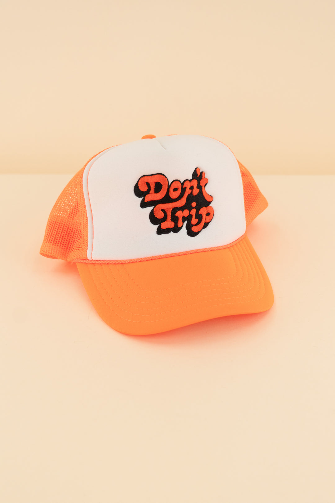 AUCTION free & easy neon orange "don't trip" embroidered trucker hat (os)
