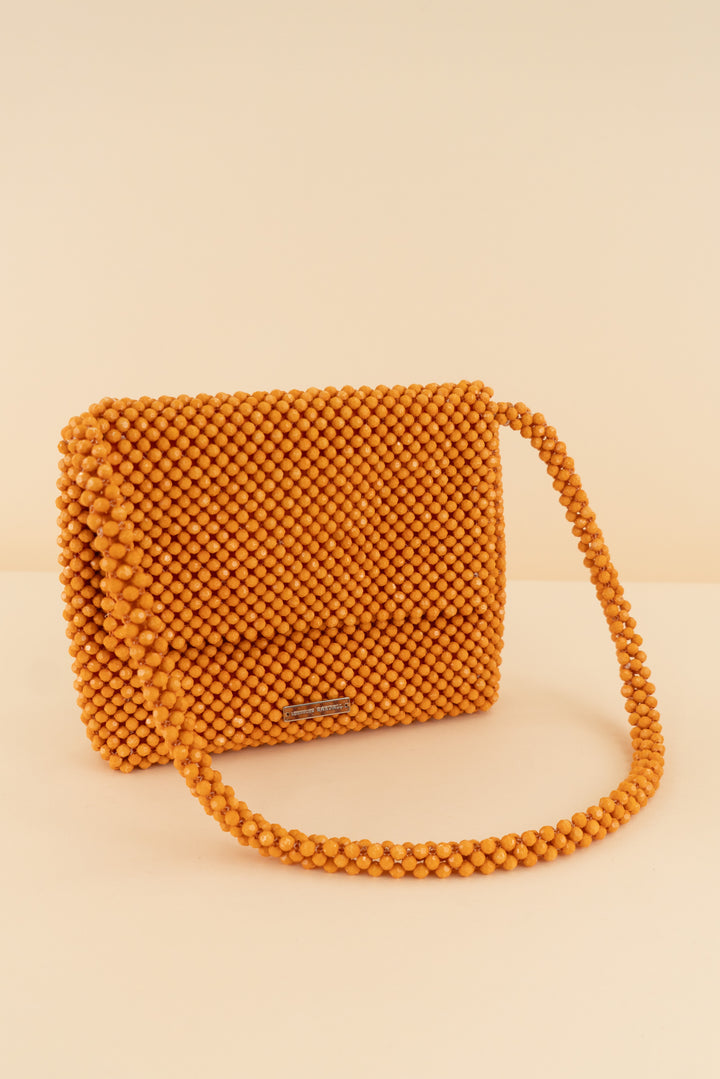 AUCTION loeffler randall orange beaded purse  (os)