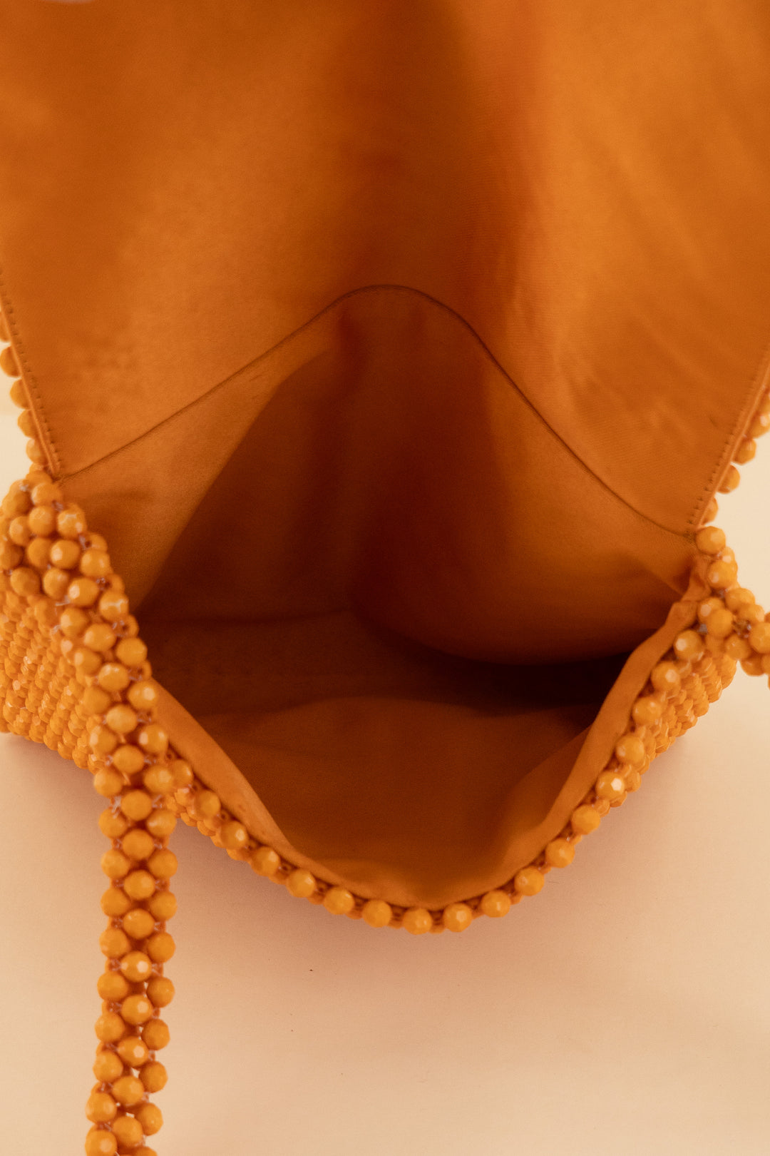 AUCTION loeffler randall orange beaded purse  (os)