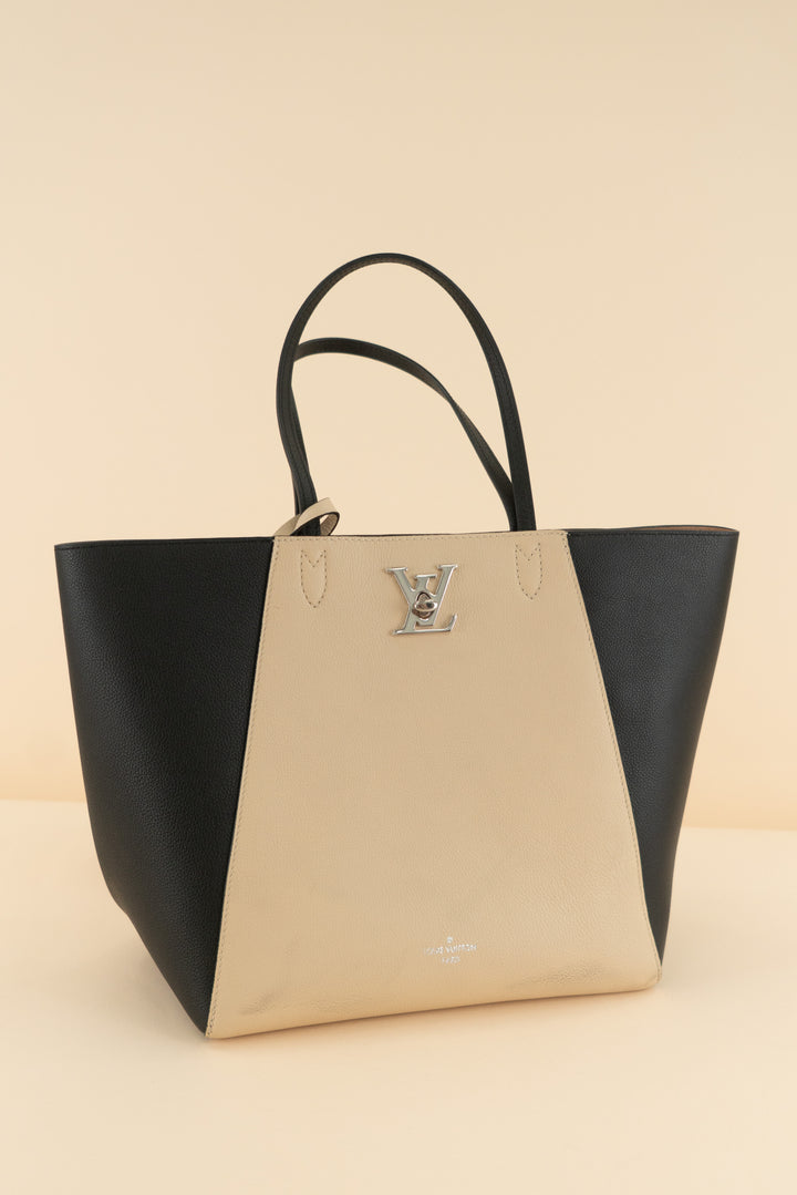 AUCTION louis vuitton black and cream lockme cabas leather tote bag (est. retail $3,250)