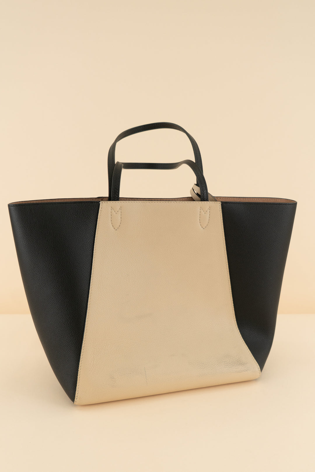AUCTION louis vuitton black and cream lockme cabas leather tote bag (est. retail $3,250)