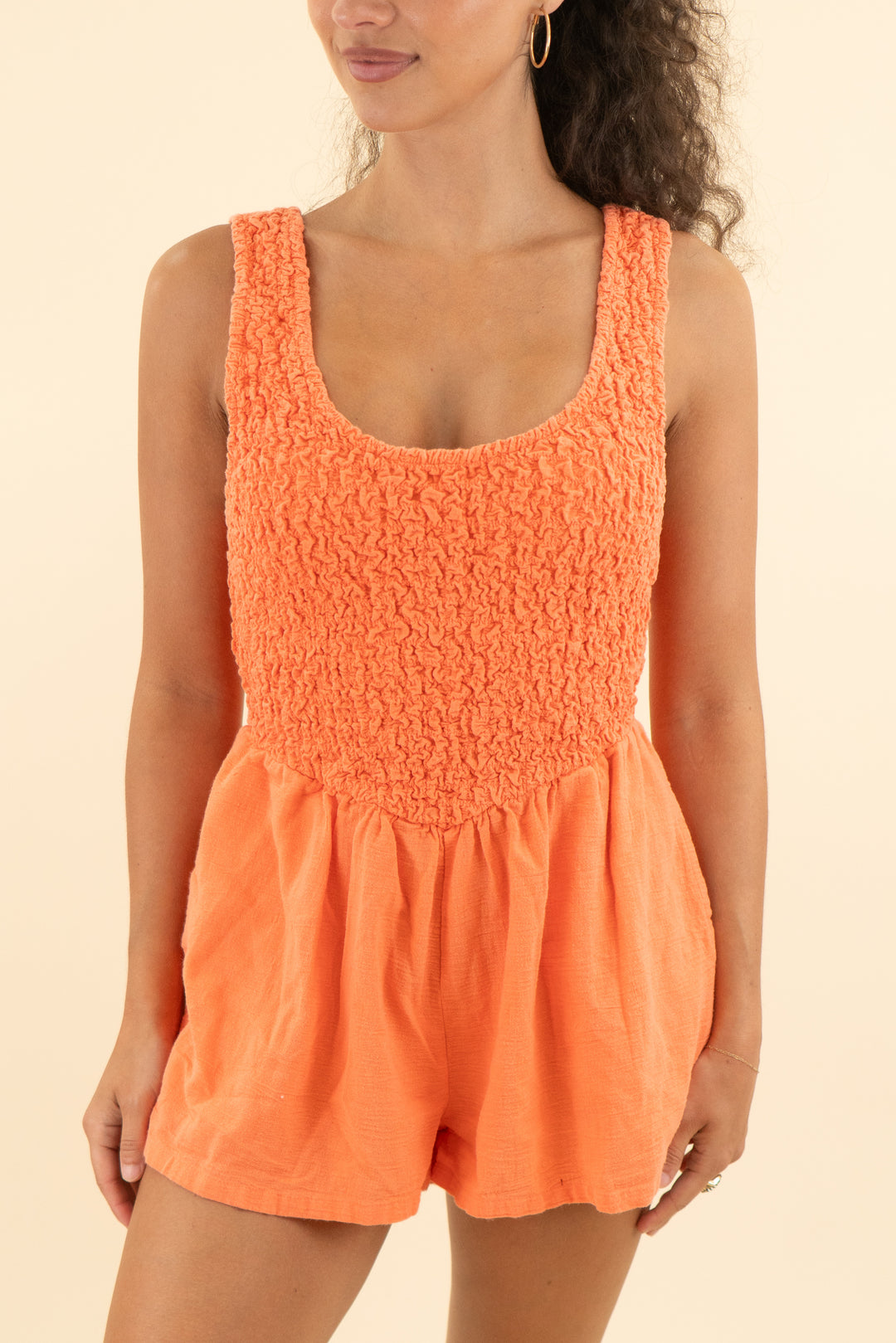 free people orange coral smocked romper (m; retail $78)
