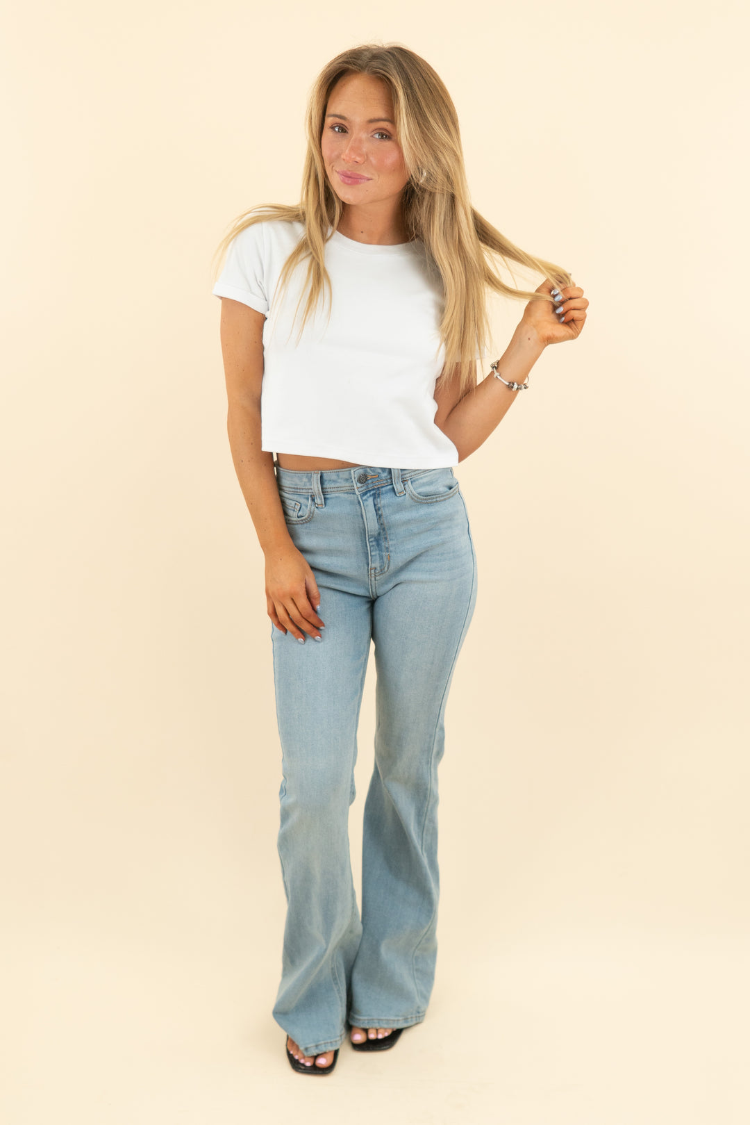 carly jeans light wash flare jeans (5; retail $98)