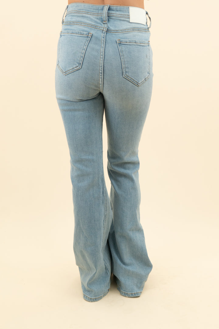 carly jeans light wash flare jeans (5; retail $98)