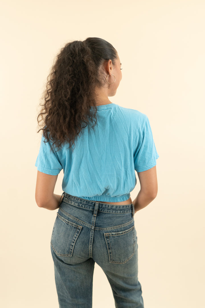 pretty little thing turquoise short sleeve crop top (m; retail $57)