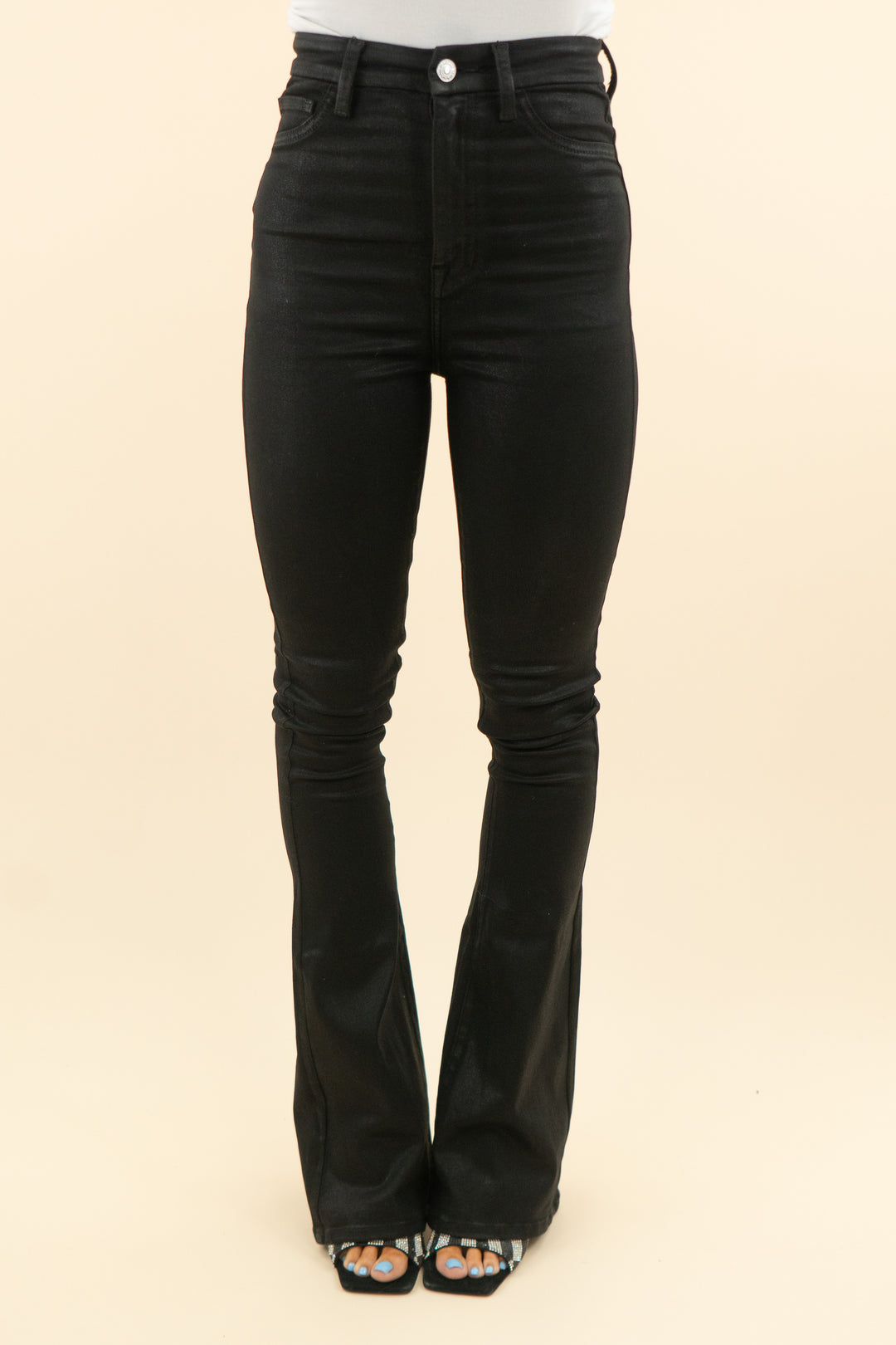 7 for all mankind black coated flare pants (24; retail $225)