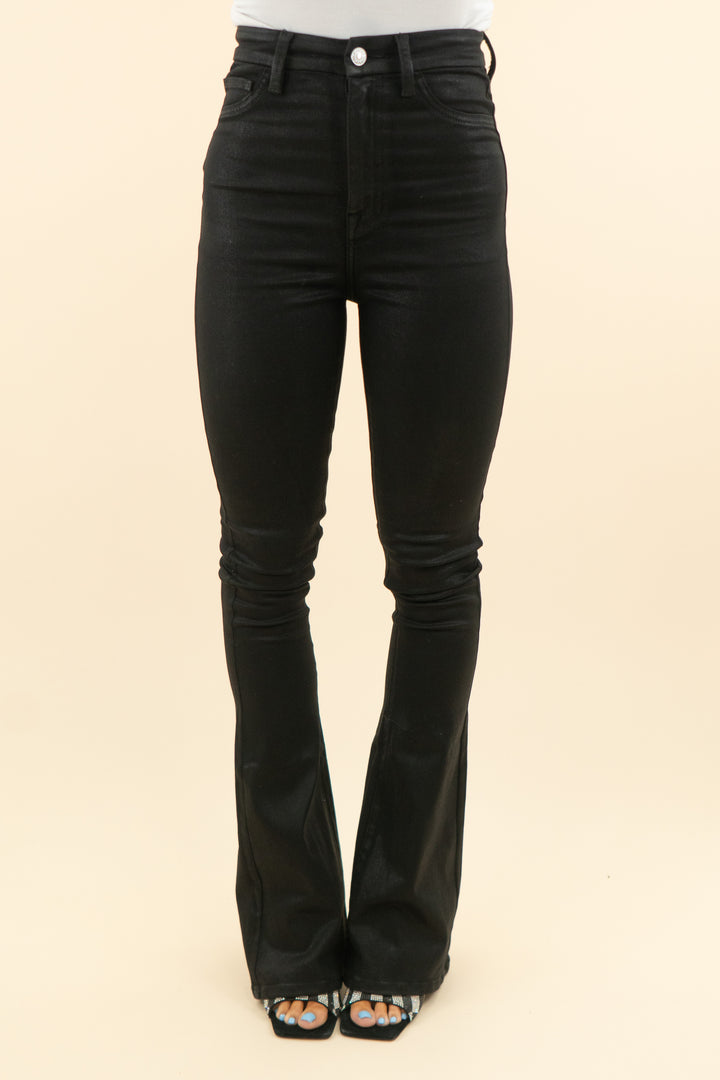 7 for all mankind black coated flare pants (24; retail $225)