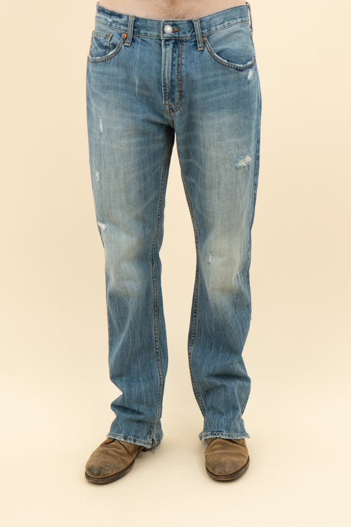 AUCTION american eagle medium wash original straight distressed jeans (34)- JASON
